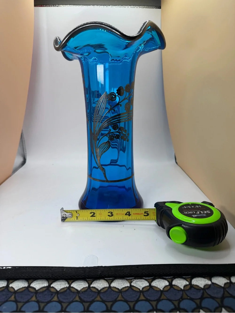 Blue Glass Ruffled Edge Decorative Vase with Sterling Silver Floral Overlay.